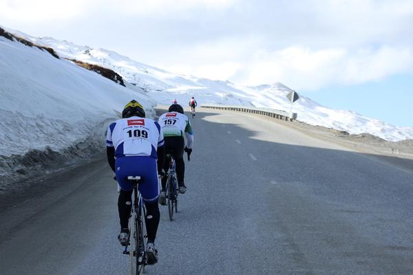 Team racers Cycling up Coronet Peak  Stage 5